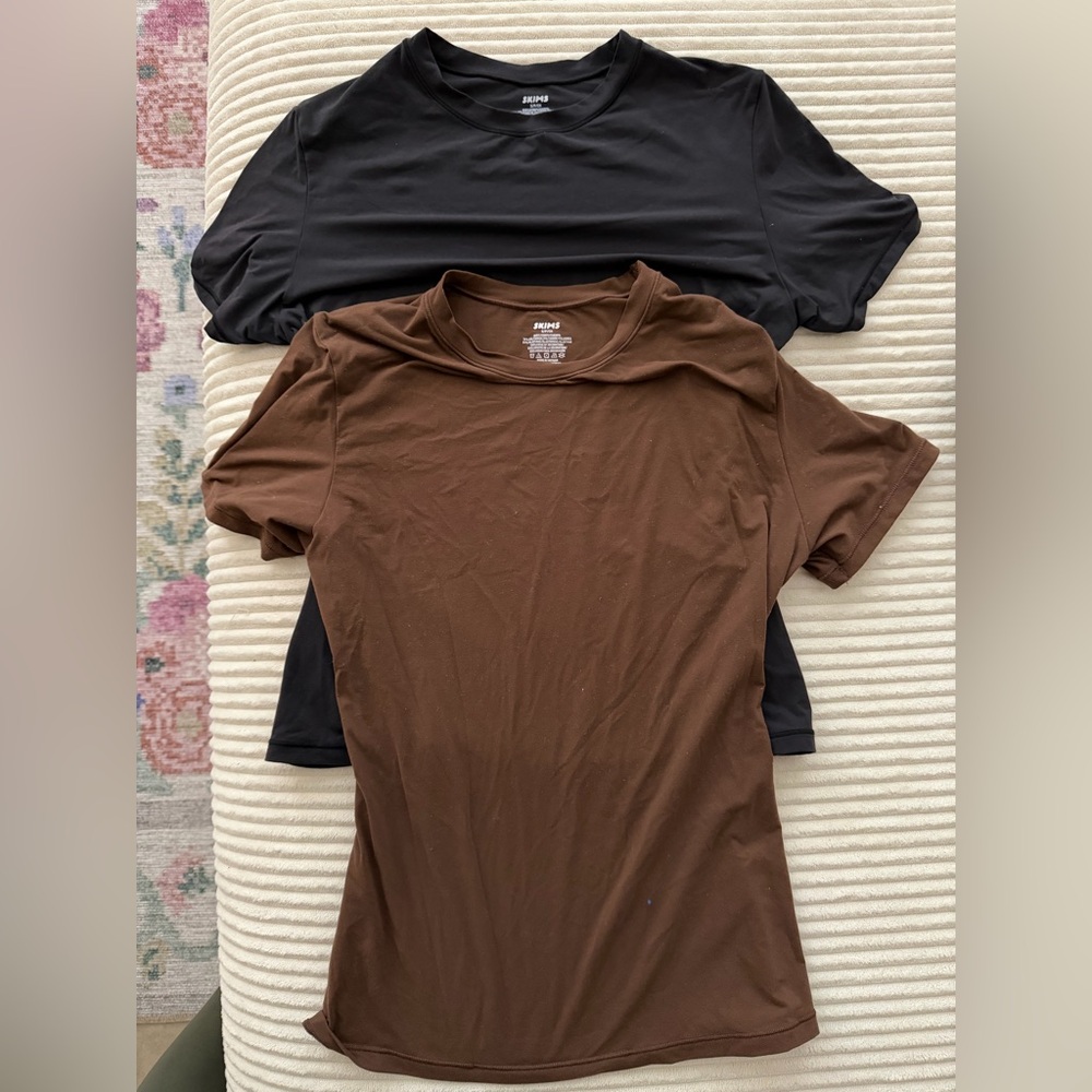 2 SKIMS soft and seamless t shirts.